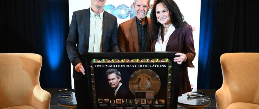 Randy Travis Receives Career Plaque From RIAA Celebrating 23 Million Certified Units